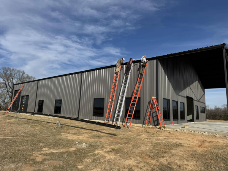 commercial-gutter-maintenance-ladders-on-metal-building-exterior