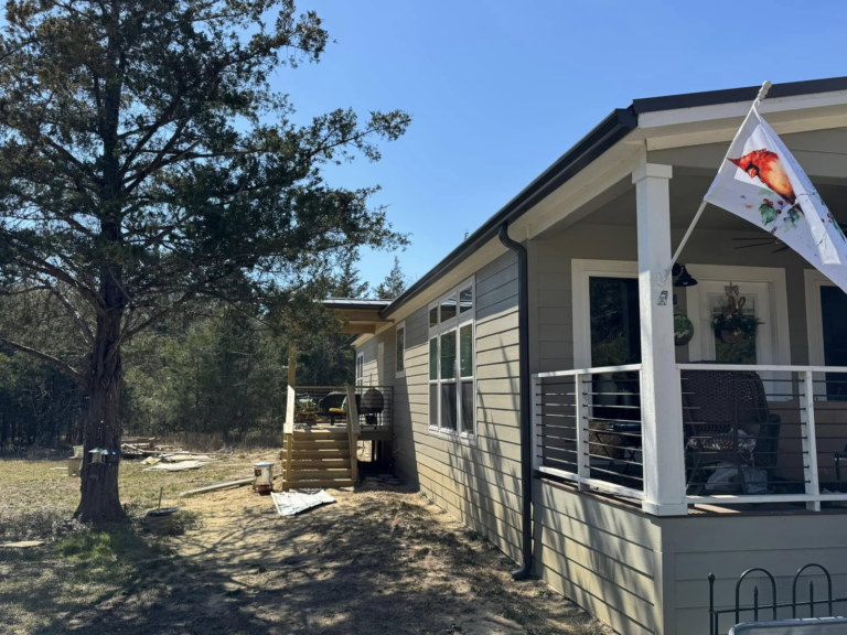 exterior-home-with-trees-and-porch-rain-gutter-replacement