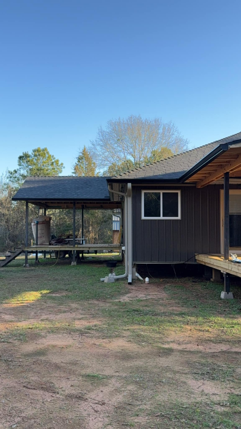 firefighter-owned-gutter-company-modern-house-with-deck-and-yard