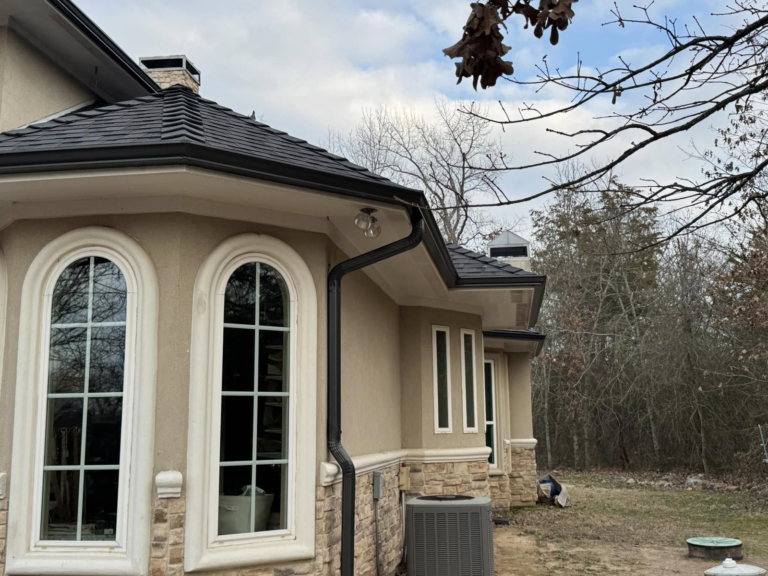 gutter-cleaning-home-roof-view-with-windows-and-trees