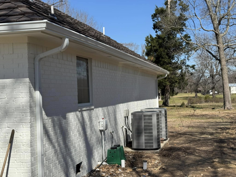 gutter-contractor-near-me-home-exterior-with-ac-units