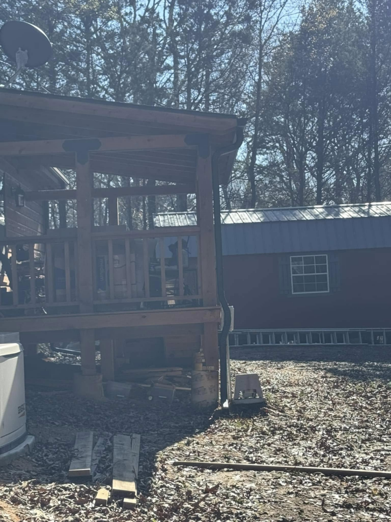 gutter-guards-for-homes-installation-near-a-wooden-structure