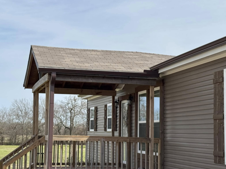 local-gutter-installer-east-texas-on-home-porch-roofing-project