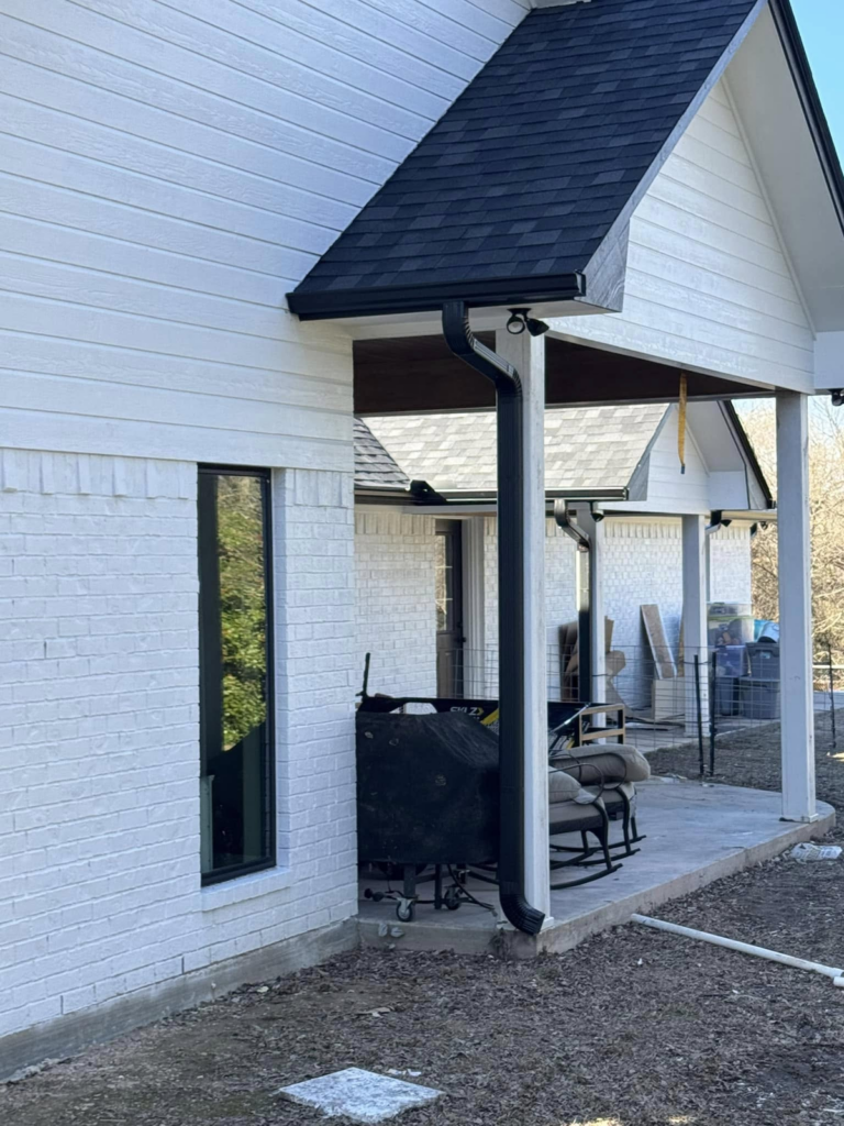 new-home-construction-with-roof-drainage-trusted-gutter-contractor