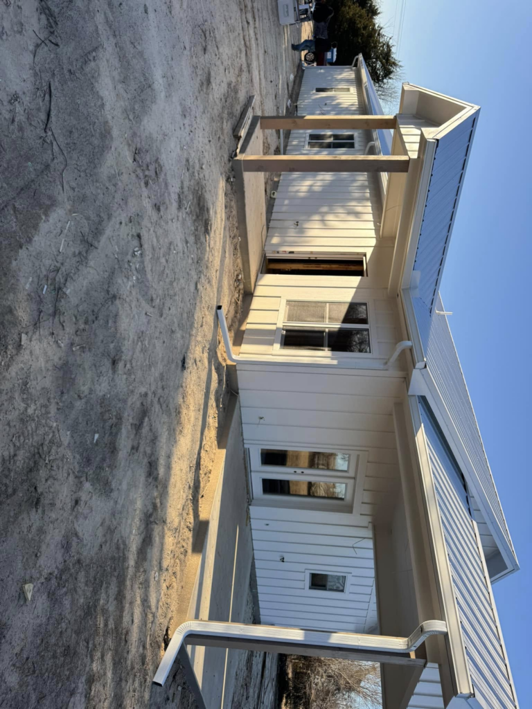 new-home-with-french-drain-installation-services-and-yard-work