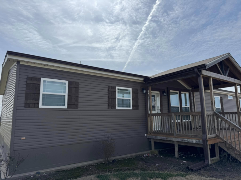 new-home-with-porch-and-gutter-guards-for-homes