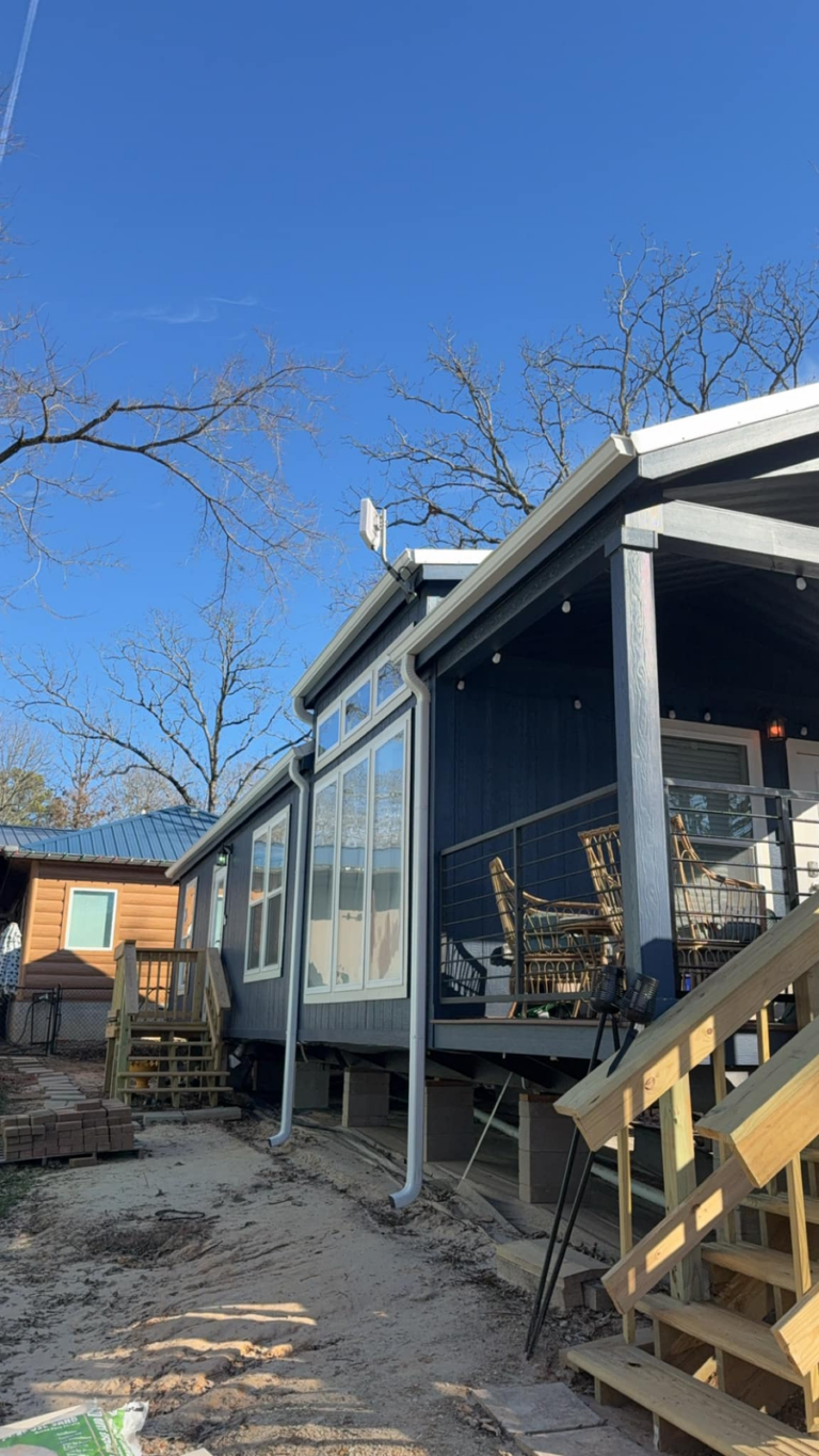 new-home-with-porch-and-residential-gutter-solutions