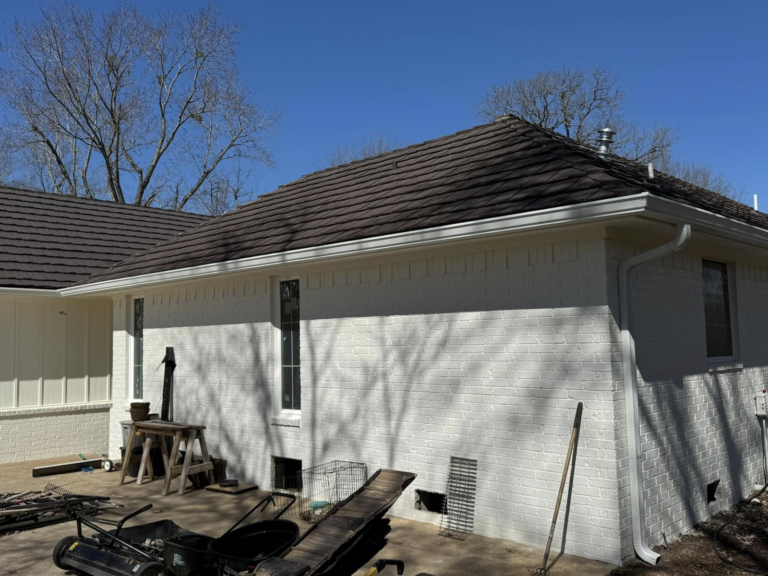 new-white-brick-house-seamless-gutter-installation-completed