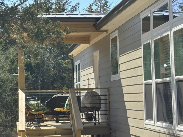 seamless-gutter-installation-on-modern-home-porch-and-roof