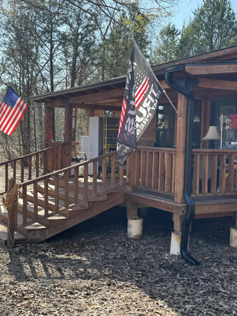 wooden-deck-with-steps-and-gutter-guards-for-homes